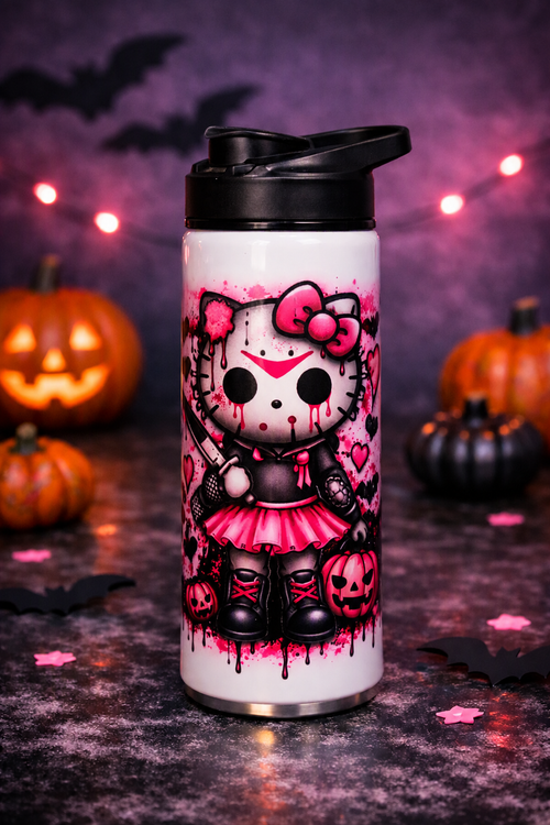 Tumbler with a pink and black Halloween kitty design, pumpkins, and a bow